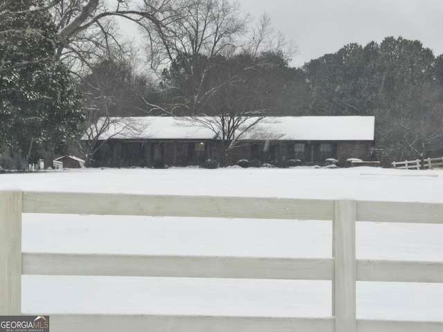 view of yard covered in snow