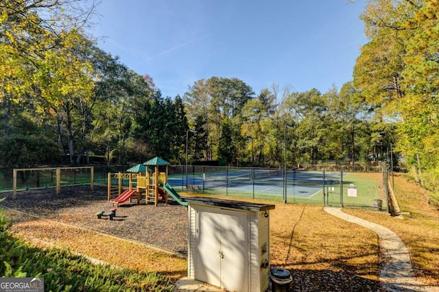 view of playground with tennis court