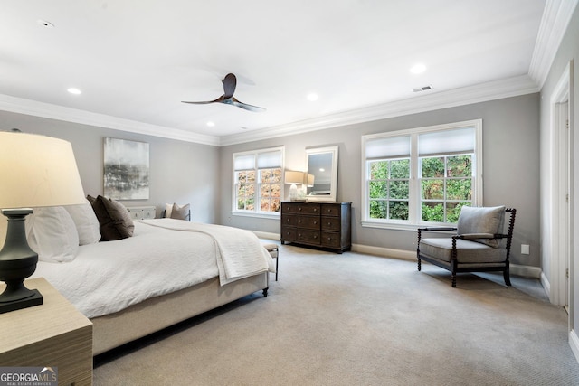 bedroom featuring light carpet, ceiling fan, and ornamental molding