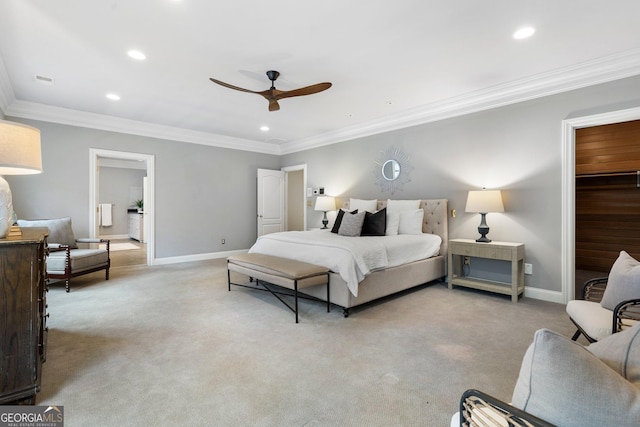 carpeted bedroom with ceiling fan, a spacious closet, crown molding, and a closet