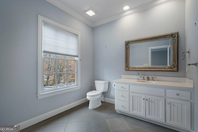 bathroom with tile patterned floors, vanity, toilet, and crown molding