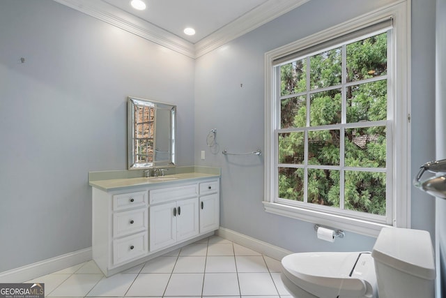 bathroom with tile patterned flooring, vanity, and ornamental molding