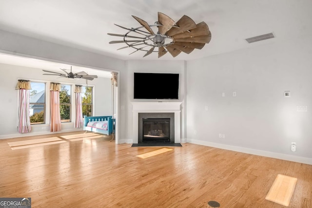 unfurnished living room with light wood-type flooring