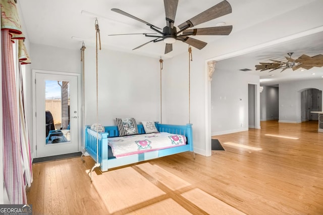 bedroom featuring ceiling fan and wood-type flooring