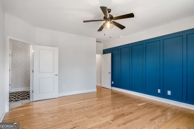 interior space featuring ceiling fan and light hardwood / wood-style flooring