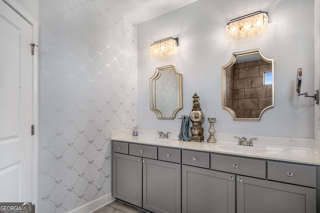 bathroom with tile patterned flooring and vanity