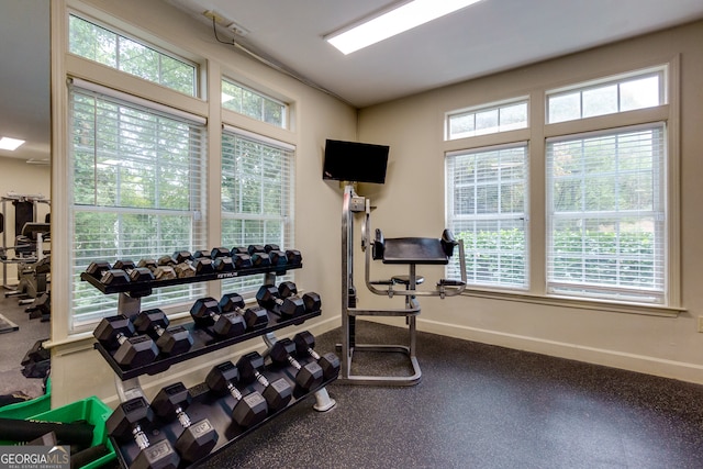 workout area featuring a wealth of natural light