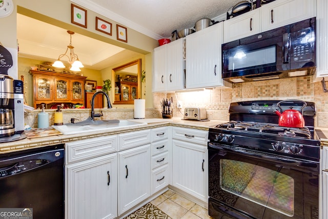 kitchen with white cabinetry, sink, black appliances, light tile patterned floors, and crown molding