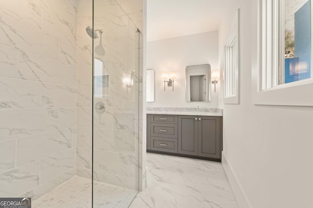 10871 Serenbe Ln, Chattahoochee Hills, GA 30268 - bathroom with walk in shower, marble look tile flooring, and vanity