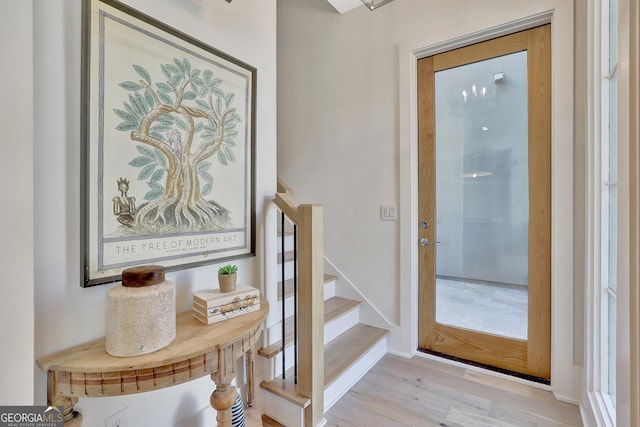 10871 Serenbe Ln, Chattahoochee Hills, GA 30268 - staircase featuring wood finished floors and baseboards
