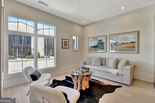 10871 Serenbe Ln, Chattahoochee Hills, GA 30268 - living room featuring light wood-style floors and recessed lighting