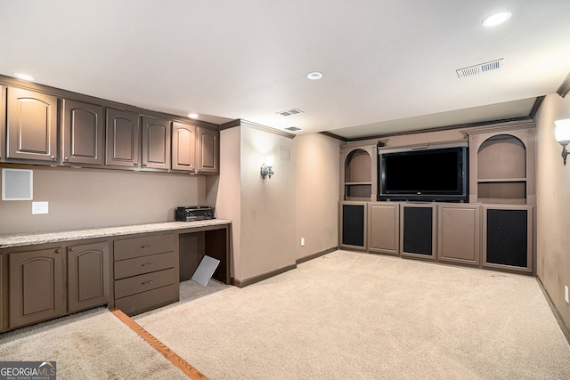 interior space featuring crown molding