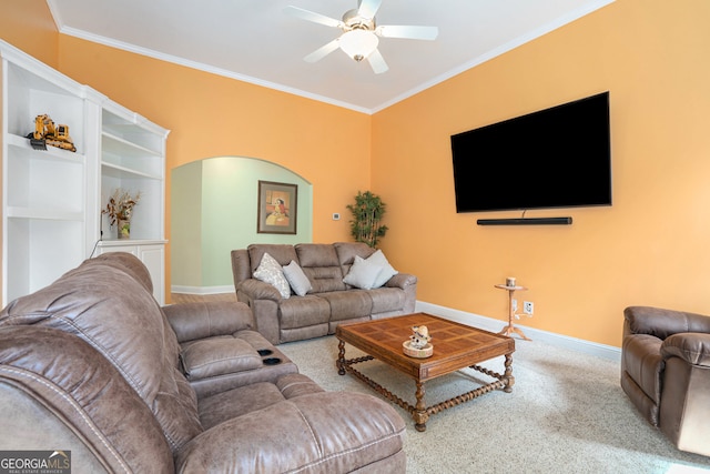 living room featuring ceiling fan, crown molding, and carpet floors