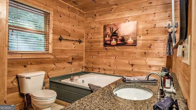 bathroom with toilet, wood ceiling, wooden walls, a bathtub, and vanity