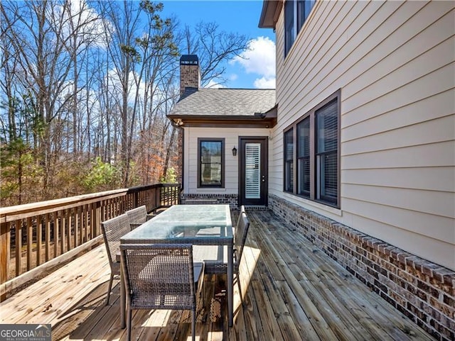 deck featuring outdoor dining space