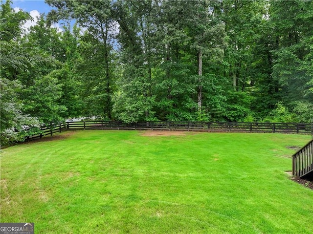 view of yard with fence