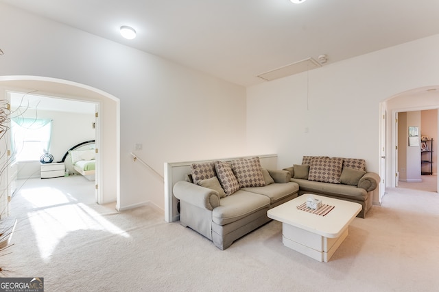 living room with light colored carpet