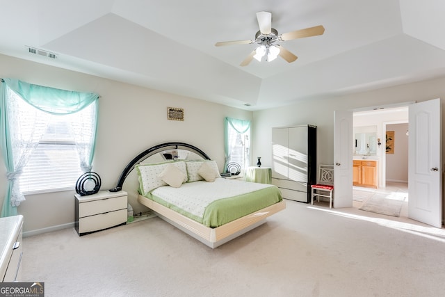 bedroom featuring multiple windows, carpet flooring, and ceiling fan