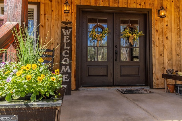 entrance to property featuring french doors