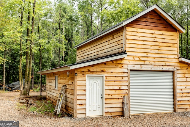 view of outbuilding featuring a garage