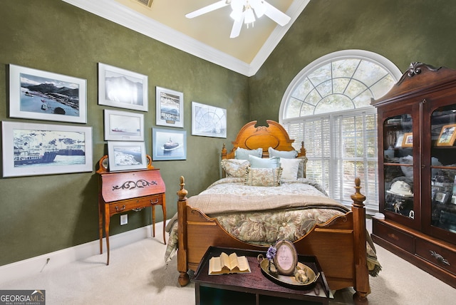 carpeted bedroom with ornamental molding, ceiling fan, and vaulted ceiling