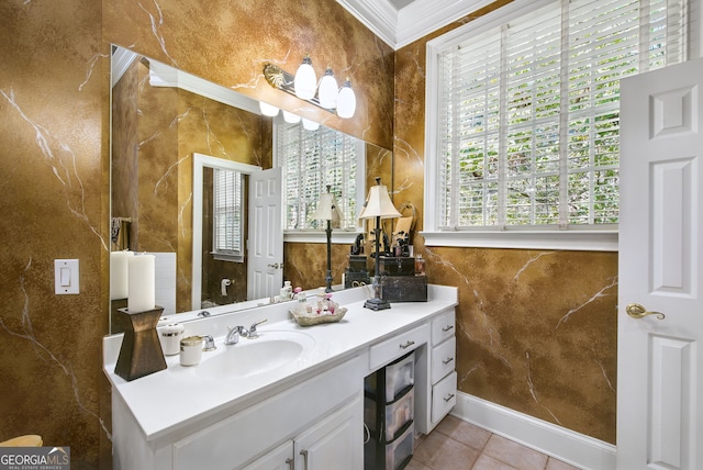 bathroom with vanity, a wealth of natural light, tile patterned floors, and ornamental molding