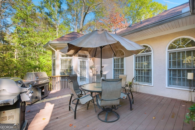 wooden deck featuring grilling area