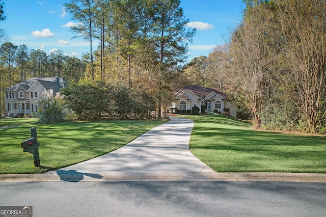 view of front of property with a front lawn