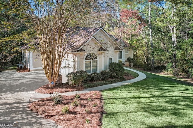 view of front of home with a front yard