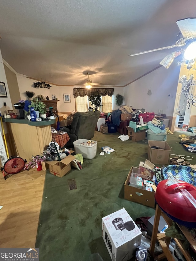 miscellaneous room featuring ceiling fan and wood-type flooring