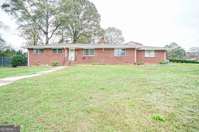 ranch-style home with a front yard