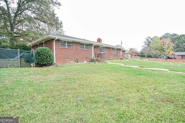 single story home with a front yard