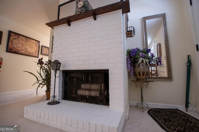 details featuring carpet floors and a brick fireplace