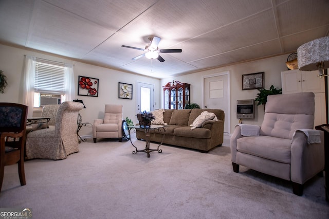 carpeted living room with cooling unit, plenty of natural light, ceiling fan, and heating unit