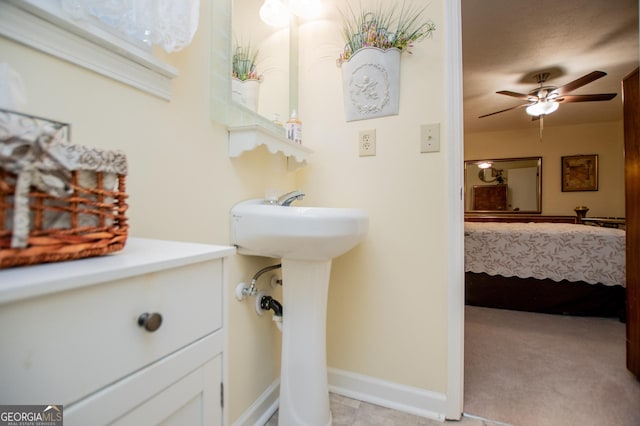 bathroom with ceiling fan