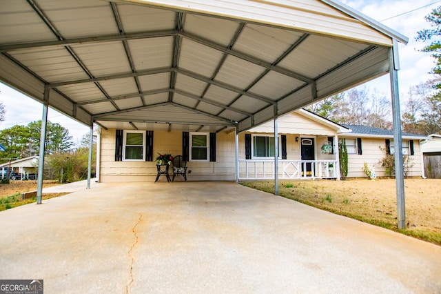 exterior space featuring a porch and a carport