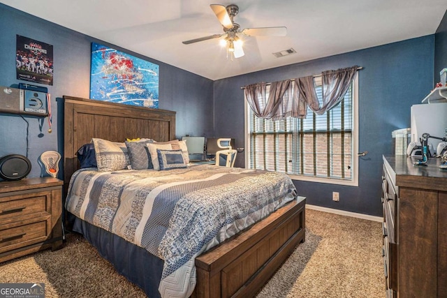 carpeted bedroom featuring ceiling fan