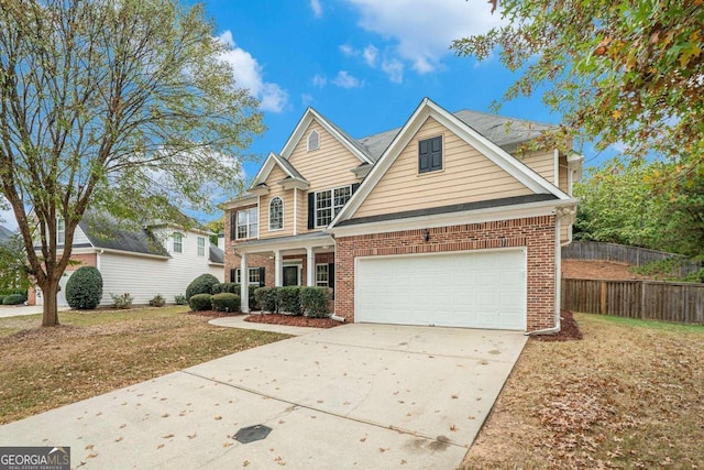 view of front of home featuring a garage and a front lawn