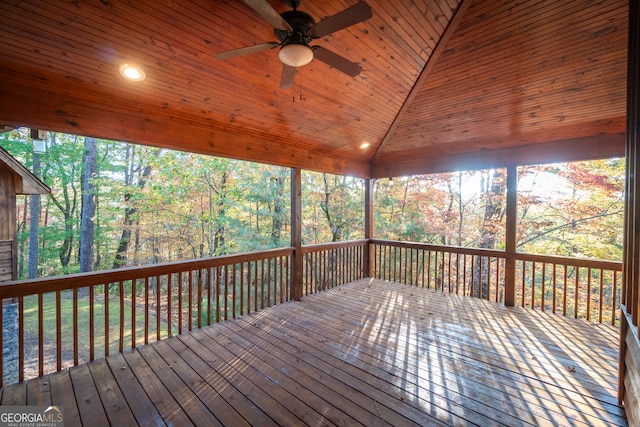 wooden terrace featuring ceiling fan