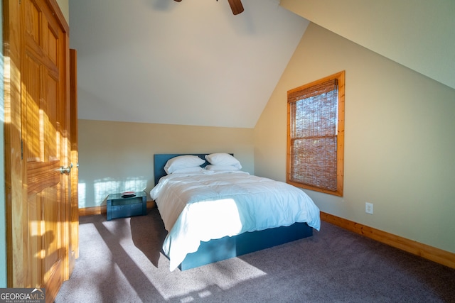 bedroom featuring carpet, ceiling fan, and vaulted ceiling