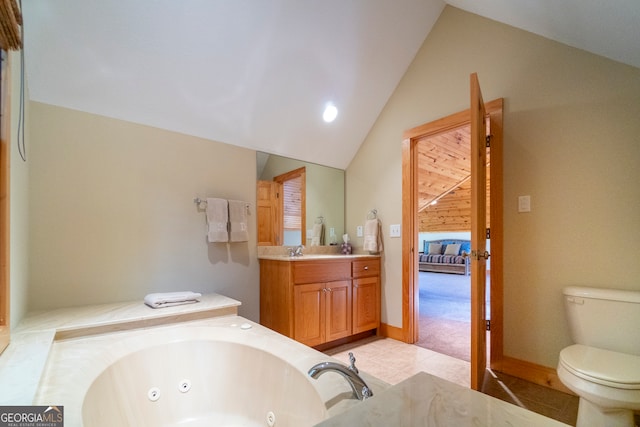 bathroom with vanity, lofted ceiling, tile patterned floors, toilet, and a tub