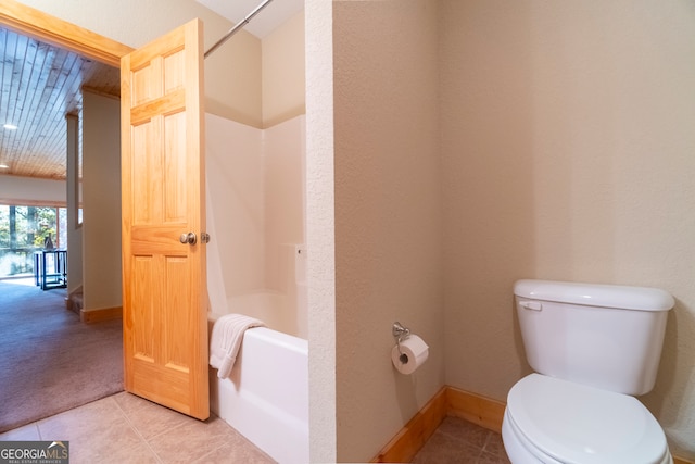 bathroom with tile patterned floors and toilet