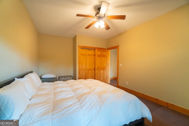 carpeted bedroom with ceiling fan and a closet