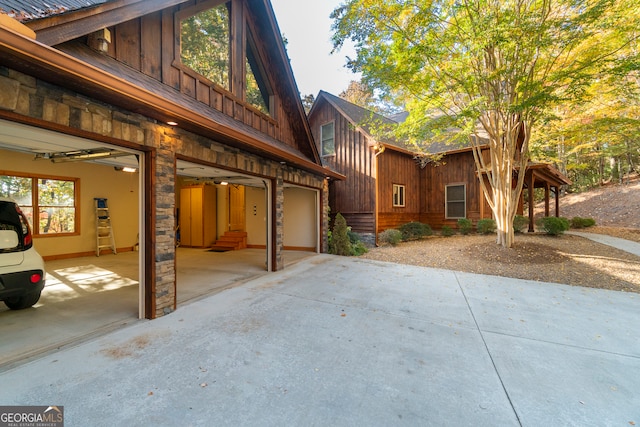 view of side of home with a garage