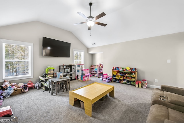 rec room featuring carpet flooring, lofted ceiling, and ceiling fan