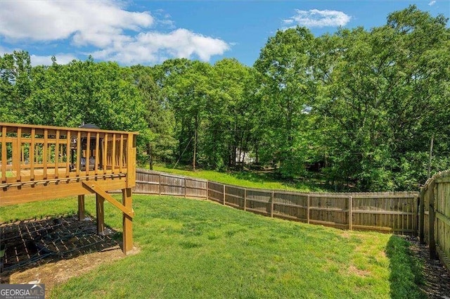 view of yard featuring a deck