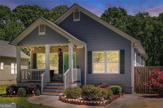 bungalow featuring covered porch