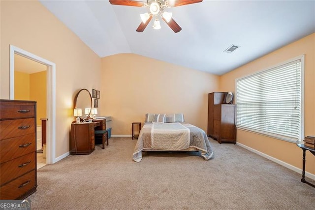 carpeted bedroom with lofted ceiling and ceiling fan