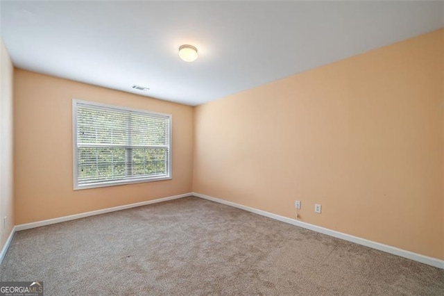 view of carpeted spare room