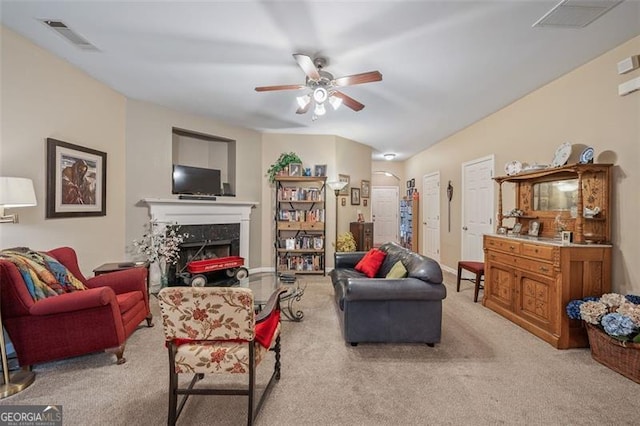 living room featuring light carpet and ceiling fan